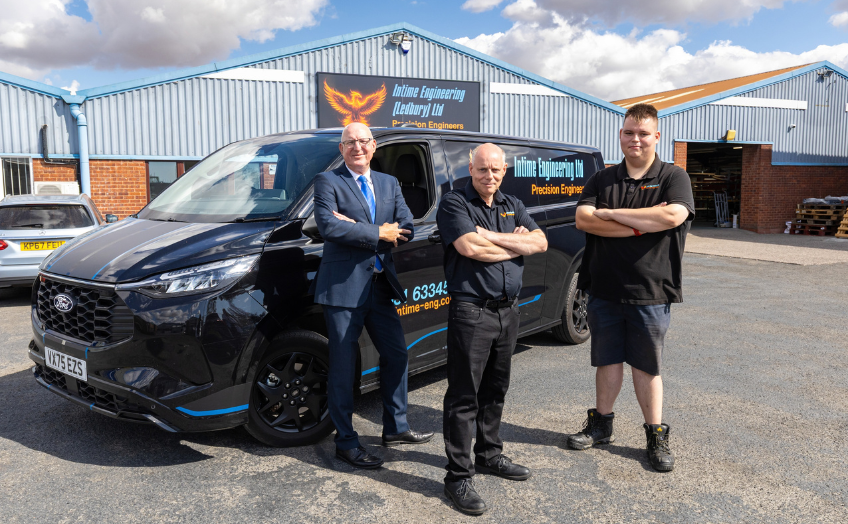 InTime Managing director and son with Mazak salesman outside facility