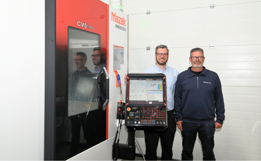 Tigfusion co-owners in front of new Mazak CV5-700