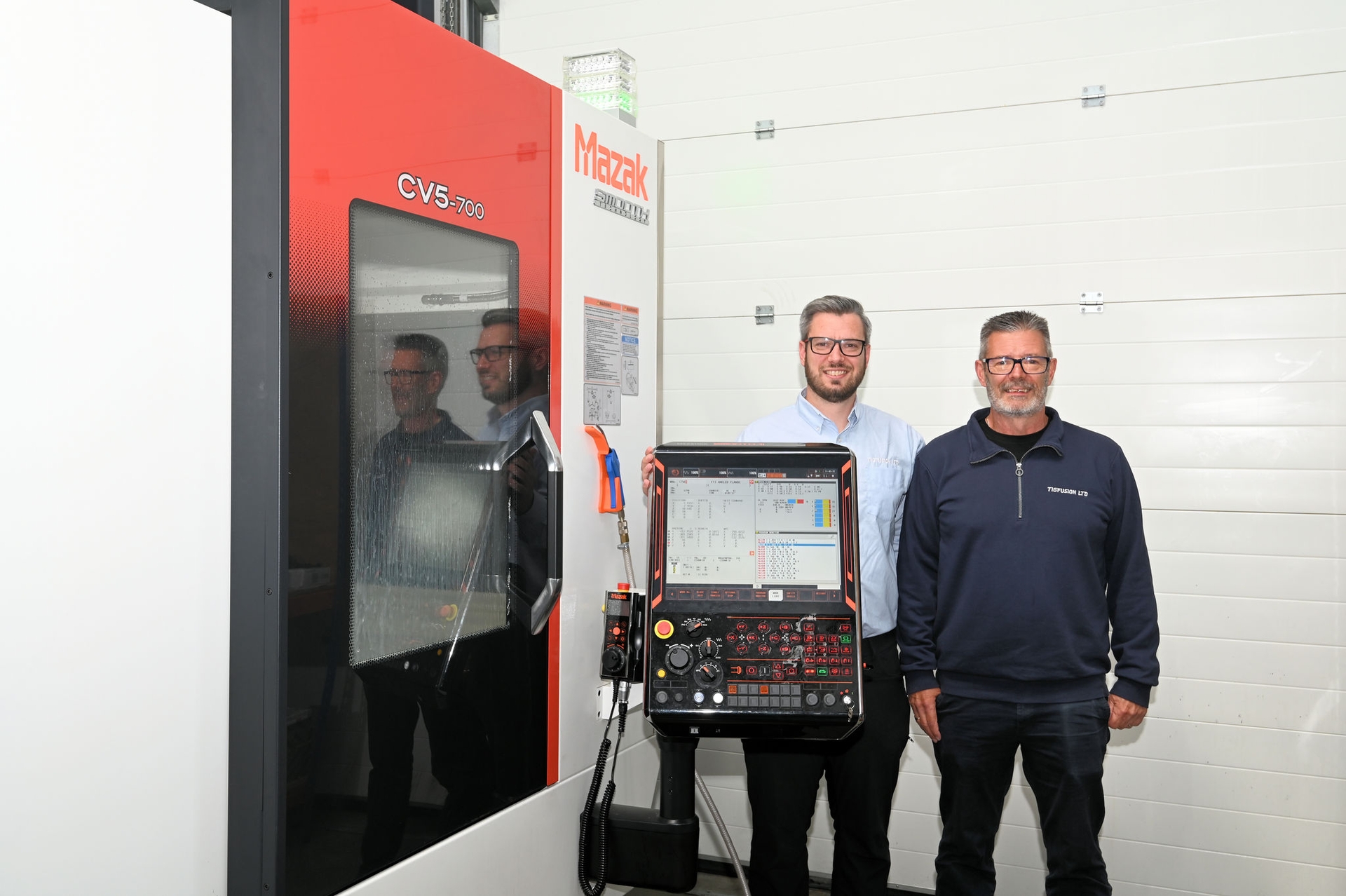 Yamazaki Mazak.
First Mazak CV5-700 5-axis machining centre purchased in UK at Tigfusion Ltd.

Jack Walsom (Managing Director, Tigfusion Ltd) and Rick Walsom (Founder, Tigfusion Ltd) with the Mazak CV5-700 5-axis machining centre.


Photo by Andy Butler
andybutlerphoto@outlook.com